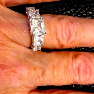 New, Sterling Silver Princess Cut multi Stone CZ ring .